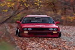 red BMW M30 with nice fall weather