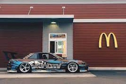 s13 with massive spoiler infornt of mcdonalds s13 with massive spoiler infornt of mcdonalds
